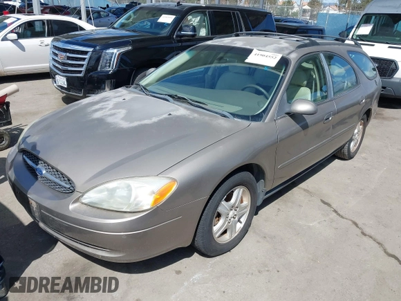 2002 Ford Taurus z VIN 1FAHP59U52G115825, wystawiony jako IAAI lot #41904552 z przebiegiem 91 004 mil mil oraz . Historia ofert i sprzedaży dostępna na DreamBid. Obrazek 2.