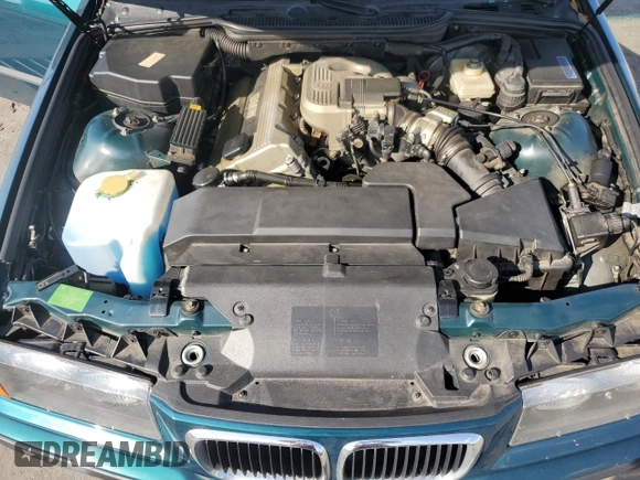 1997 BMW 3 Series 318tiA with VIN WBACG8321VAU39596, listed as a Copart auction lot 72657404 with 0 mi miles and Salvage Title. Bid and sale history available at carsss.com. Image 13.