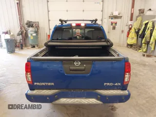 2015 Nissan Frontier SV with VIN 1N6AD0EV4FN709892, listed as a IAAI auction lot 42473594 with 153,103 mi miles and . Bid and sale history available at DreamBid. Image 16.