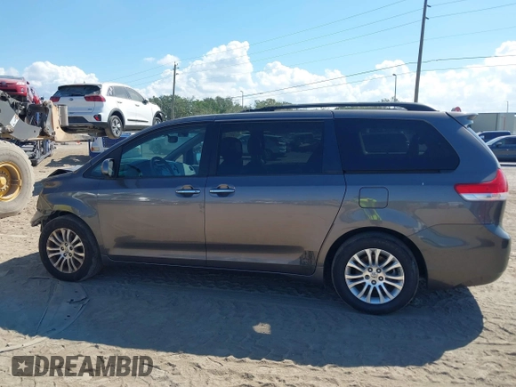 2012 Toyota Sienna XLE AAS with VIN 5TDYK3DC1CS186331, listed as a IAAI auction lot 41545031 with 240,788 mi miles and . Bid and sale history available at DreamBid. Image 14.
