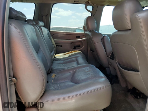 2005 Chevrolet Suburban LT z VIN 3GNEC16Z15G280353, wystawiony jako Copart lot #53974785 z przebiegiem 389 849 mil mil oraz Nie do naprawy. Historia ofert i sprzedaży dostępna na DreamBid. Obrazek 11.