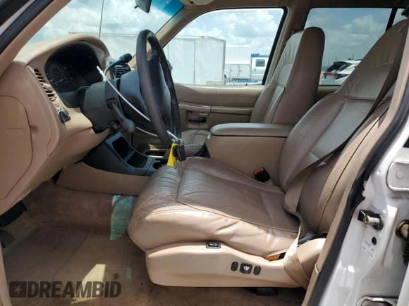 1998 Ford Explorer with VIN 1FMZU32X7WZB87549, listed as a Copart auction lot 60970165 with 186,022 mi miles and Salvage title. Bid and sale history available at DreamBid. Image 7.