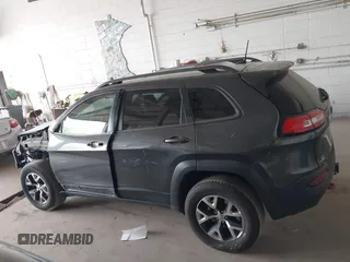 2016 Jeep Cherokee Trailhawk with VIN 1C4PJMBS0GW169184, listed as a IAAI auction lot 42255346 with 152,802 mi miles and . Bid and sale history available at DreamBid. Image 14.