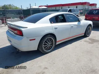 2014 Dodge Charger SE with VIN 2C3CDXBG2EH258886, listed as a IAAI auction lot 42104999 with 185,723 mi miles. Bid and sale history available at carsss.com. Image 4.