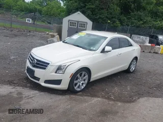 2014 Cadillac ATS Standard RWD with VIN 1G6AA5RA5E0173517, listed as a IAAI auction lot 42540181 with 73,732 mi miles and . Bid and sale history available at DreamBid. Image 2.