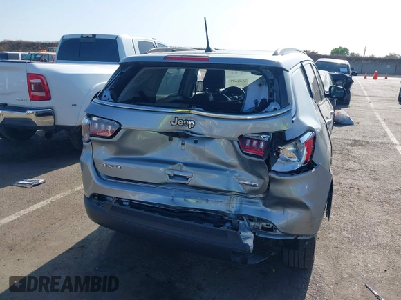 2022 Jeep Compass Latitude Lux with VIN 3C4NJDFB9NT170662, listed as a IAAI auction lot 42500321 with 57,782 mi miles and . Bid and sale history available at DreamBid. Image 6.