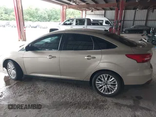 2017 Ford Focus Titanium with VIN 1FADP3J26HL279839, listed as a IAAI auction lot 42466826 with 202,795 mi miles and . Bid and sale history available at DreamBid. Image 14.