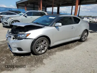 2011 Scion tC with VIN JTKJF5C74B3010047, listed as a Copart auction lot 47317555 with 125,659 mi miles and Salvage Title. Bid and sale history available at carsss.com. Image 1.