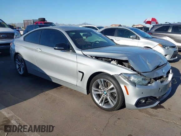 2015 BMW 4 Series 428i with VIN WBA3N7C54FK225045, listed as a IAAI auction lot 42042980 with 72,909 mi miles. Bid and sale history available at carsss.com. Image 1.