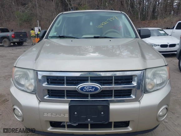 2011 Ford Escape XLT with VIN 1FMCU9D70BKA77676, listed as a IAAI auction lot 41921757 with 288,545 mi miles. Bid and sale history available at carsss.com. Image 6.