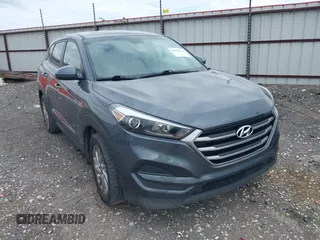 2017 Hyundai Tucson SE with VIN KM8J23A45HU593761, listed as a IAAI auction lot 41885334 with 198,658 mi miles. Bid and sale history available at carsss.com. Image 1.