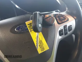 2014 Ford Explorer with VIN 1FM5K8B83EGB31774, listed as a IAAI auction lot 41540918 with 209,218 mi miles and . Bid and sale history available at carsss.com. Image 11.