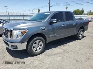 2017 Nissan Titan SV with VIN 1N6AA1EJ2HN521497, listed as a Copart auction lot 56995305 with 154,637 mi miles and Salvage title. Bid and sale history available at DreamBid. Image 1.