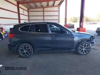 2021 BMW X1 xDrive28i with VIN WBXJG9C02M5T41170, listed as a IAAI auction lot 41886408 with 56,316 mi miles. Bid and sale history available at carsss.com. Image 14.