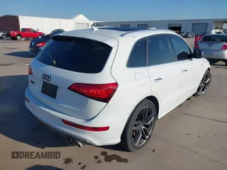 2015 Audi SQ5 Premium Plus with VIN WA1CGAFP9FA104924, listed as a IAAI auction lot 41198592 with 123,882 mi miles. Bid and sale history available at carsss.com. Image 4.