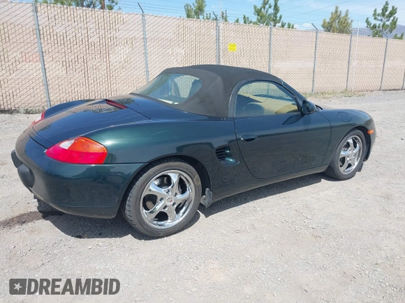 1999 Porsche Boxster with VIN WP0CA2986XU627495, listed as a IAAI auction lot 42112724 with 94,090 mi miles and . Bid and sale history available at DreamBid. Image 4.