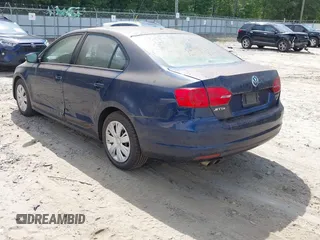 2012 Volkswagen Jetta SE with VIN 3VWDX7AJXCM321247, listed as a IAAI auction lot 42847011 with 232,459 mi miles and . Bid and sale history available at DreamBid. Image 3.