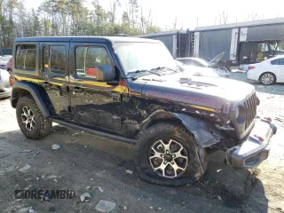 2021 Jeep Wrangler Unlimited Rubicon with VIN 1C4HJXFGXMW580776, listed as a Copart auction lot 46478105 with 56,120 mi miles and Salvage Title. Bid and sale history available at DreamBid. Image 4.