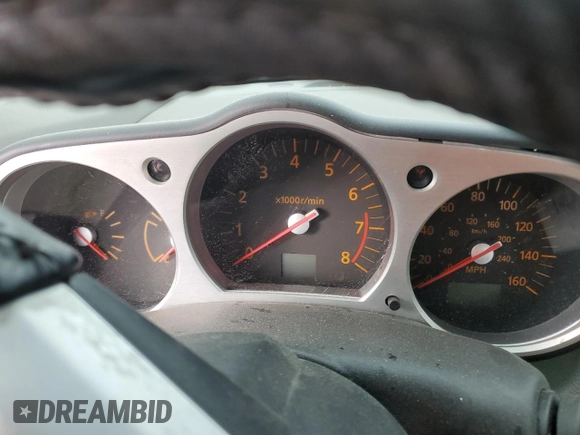 2004 Nissan 350Z Enthusiast z VIN JN1AZ36A74T013105, wystawiony jako Copart lot #82797874 z przebiegiem Nie podano mil oraz Szkoda całkowita • Salvage title. Historia ofert i sprzedaży dostępna na DreamBid. Obrazek 9.