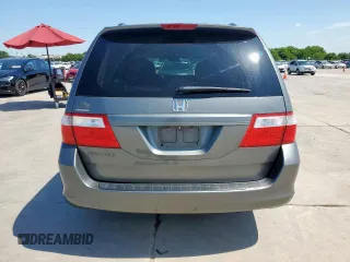 2007 Honda Odyssey EX with VIN 5FNRL38437B068697, listed as a Copart auction lot 60875505 with 211,688 mi miles and Salvage title. Bid and sale history available at DreamBid. Image 6.