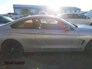 2015 BMW 4 Series 435i xDrive z VIN WBA3R5C5XFK371491, wystawiony jako IAAI lot #40755251 z przebiegiem 122 181 mil mil oraz . Historia ofert i sprzedaży dostępna na DreamBid. Obrazek 13.