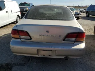 1998 Nissan Maxima GXE with VIN JN1CA21D0WM903051, listed as a Copart auction lot 47821445 with 156,748 mi miles and Salvage title. Bid and sale history available at DreamBid. Image 6.