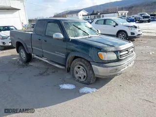 2002 Toyota Tundra SR5 with VIN 5TBBT441X2S275233, listed as a IAAI auction lot 41571226 with 168,736 mi miles. Bid and sale history available at carsss.com. Image 1.