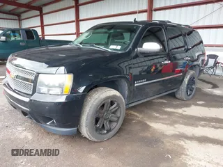 2009 Chevrolet Tahoe LTZ z VIN 1GNFK330X9R219064, wystawiony jako IAAI lot #42261154 z przebiegiem 125 511 mil mil oraz . Historia ofert i sprzedaży dostępna na DreamBid. Obrazek 17.
