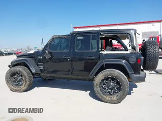 2019 Jeep Wrangler Unlimited Sahara with VIN 1C4HJXEG5KW518202, listed as a IAAI auction lot 41762229 with 91,995 mi miles and . Bid and sale history available at DreamBid. Image 15.