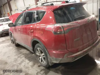 2017 Toyota RAV4 XLE with VIN JTMRFREV2HJ168971, listed as a IAAI auction lot 41504462 with 114,259 mi miles. Bid and sale history available at carsss.com. Image 3.