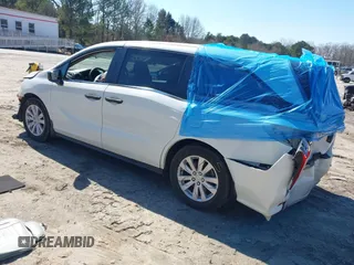 2019 Honda Odyssey LX with VIN 5FNRL6H23KB049236, listed as a IAAI auction lot 41633339 with 96,000 mi miles and . Bid and sale history available at DreamBid. Image 3.