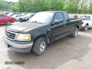 2003 Ford F-150 XL with VIN 1FTRX17263NA23449, listed as a IAAI auction lot 42111505 with 1 mi miles. Bid and sale history available at carsss.com. Image 2.