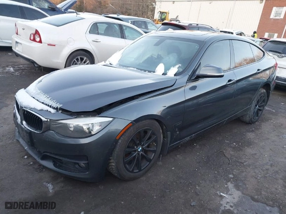 2014 BMW 3 Series Gran Turismo 328i xDrive with VIN WBA3X5C58ED556261, listed as a IAAI auction lot 41379034 with 179,429 mi miles. Bid and sale history available at carsss.com. Image 2.