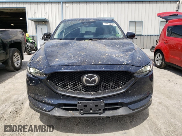 2020 Mazda CX-5 Grand Touring with VIN JM3KFBDM0L0767634, listed as a Copart auction lot 54433935 with 57,901 mi miles and Salvage Title. Bid and sale history available at carsss.com. Image 5.