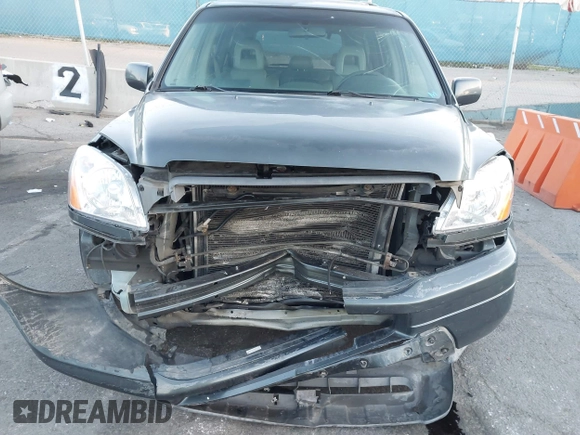2005 Honda Pilot EX-L z VIN 2HKYF187X5H514571, wystawiony jako IAAI lot #41746538 z przebiegiem 276 994 mil mil oraz . Historia ofert i sprzedaży dostępna na DreamBid. Obrazek 6.