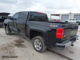 2014 Chevrolet Silverado 1500 LT with VIN 3GCUKREC5EG493728, listed as a IAAI auction lot 41710490 with 243,509 mi miles. Bid and sale history available at carsss.com. Image 3.