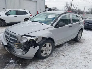 2007 Dodge Caliber SXT with VIN 1B3HB48B07D159549, listed as a IAAI auction lot 41330969 with 124,911 mi miles and . Bid and sale history available at DreamBid. Image 2.