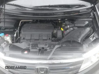 2012 Honda Odyssey EX-L with VIN 5FNRL5H6XCB057557, listed as a IAAI auction lot 42022410 with 174,286 mi miles and . Bid and sale history available at DreamBid. Image 10.