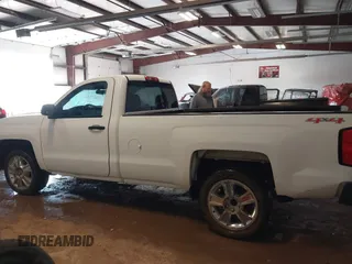 2014 Chevrolet Silverado 1500 Work Truck with VIN 1GCNKPEH5EZ266821, listed as a IAAI auction lot 41570036 with 125,916 mi miles and . Bid and sale history available at DreamBid. Image 15.