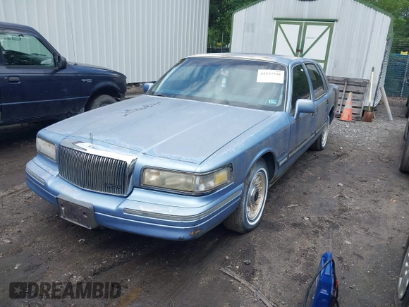 1995 Lincoln Town Car Executive with VIN 1LNLM81W9SY676031, listed as a IAAI auction lot 42537591 with 97,467 mi miles and . Bid and sale history available at DreamBid. Image 2.