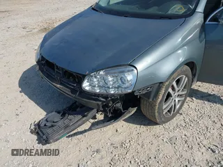 2006 Volkswagen Jetta 2.5L z VIN 3VWSF71K06M798437, wystawiony jako IAAI lot #42559453 z przebiegiem 169 485 mil mil oraz . Historia ofert i sprzedaży dostępna na DreamBid. Obrazek 6.