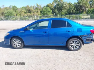 2009 Toyota Corolla with VIN JTDBL40E999021523, listed as a IAAI auction lot 42019856 with 194,011 mi miles. Bid and sale history available at carsss.com. Image 15.