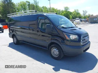 2015 Ford Transit Cargo z VIN 1FTBW2YG7FKA20201, wystawiony jako IAAI lot #42253463 z przebiegiem 83 235 mil mil oraz . Historia ofert i sprzedaży dostępna na DreamBid. Obrazek 1.