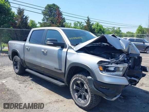 2019 Ram 1500 Rebel with VIN 1C6SRFLT8KN797618, listed as a IAAI auction lot 42556663 with 92,606 mi miles and . Bid and sale history available at DreamBid. Image 1.