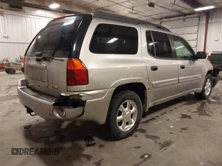 2005 GMC Envoy SLE with VIN 1GKET16S656102522, listed as a IAAI auction lot 41729310 with 233,049 mi miles. Bid and sale history available at carsss.com. Image 4.