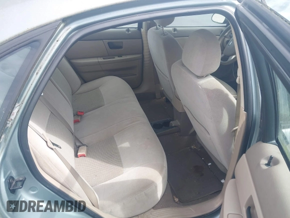 2005 Ford Taurus SE with VIN 1FAFP53U55A209369, listed as a IAAI auction lot 42144800 with 152,446 mi miles. Bid and sale history available at carsss.com. Image 8.