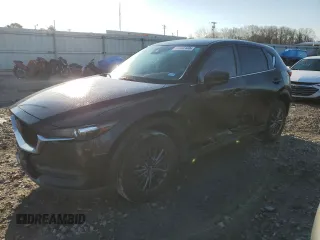2019 Mazda CX-5 Touring with VIN JM3KFACM0K0671285, listed as a Copart auction lot 47800125 with 41,043 mi miles and Salvage Title. Bid and sale history available at carsss.com. Image 1.