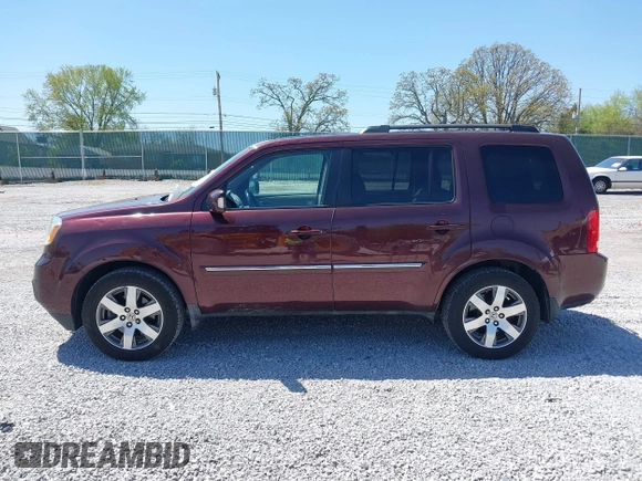 2012 Honda Pilot Touring with VIN 5FNYF4H90CB020623, listed as a IAAI auction lot 42048740 with 162,504 mi miles. Bid and sale history available at carsss.com. Image 14.