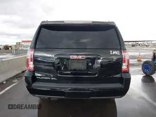 2019 GMC Yukon XL SLT with VIN 1GKS1GKC7KR155668, listed as a IAAI auction lot 41751792 with 163,537 mi miles. Bid and sale history available at carsss.com. Image 17.