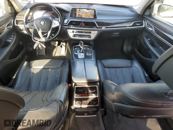 2016 BMW 7 Series 750i xDrive с VIN WBA7F2C58GG419163, выставлен на аукционе Copart как лот 52429835 с пробегом 93 025 миль миль и Списание • Salvage title. История ставок и продаж доступна на DreamBid. Изображение 8.